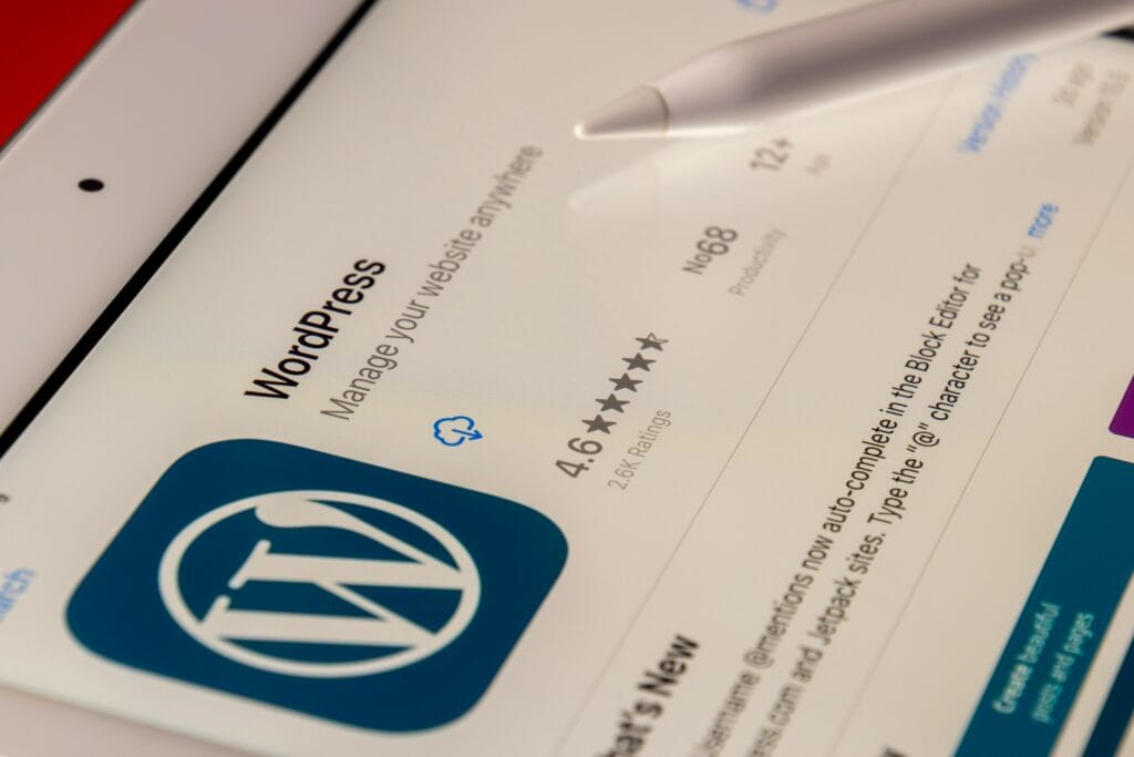 Screenshot of the WordPress app on a tablet, showcasing WordPress design and management features with a high user rating, representing the popularity and accessibility of WordPress for website design.